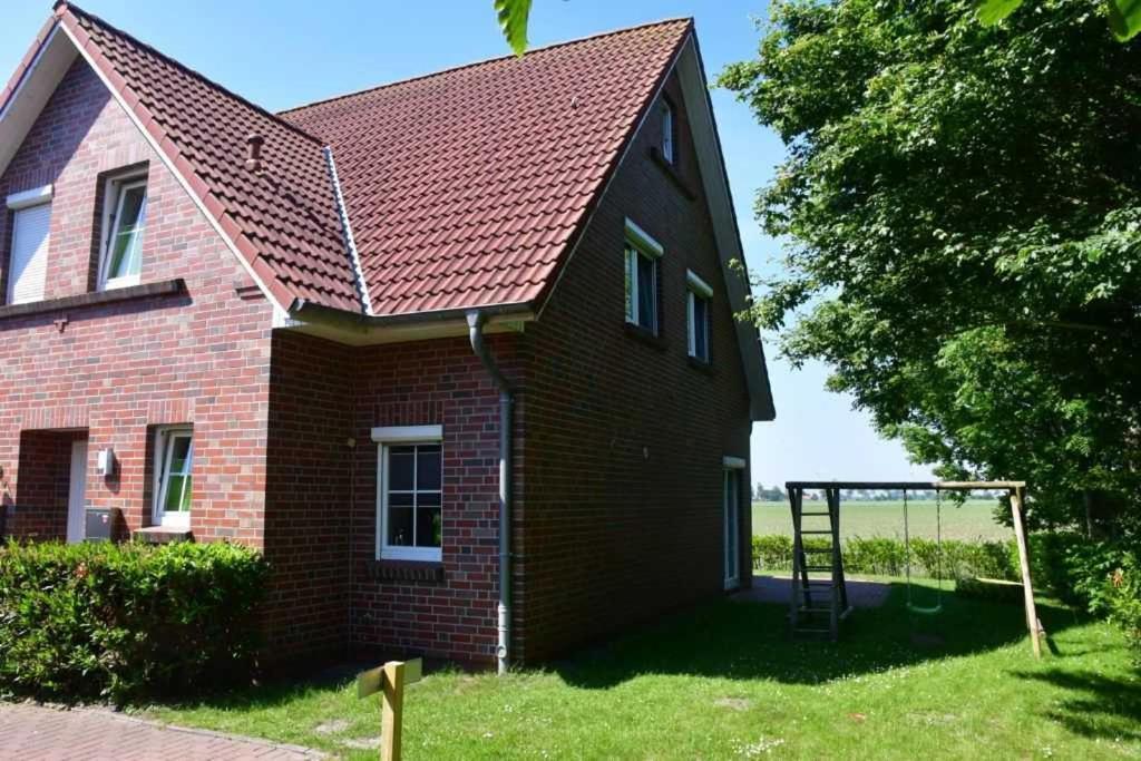 Ferienhaus Carolinenwind Каролинензиль Экстерьер фото